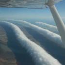 Это чрезвычайно редкий тип облака (Morning Glory)